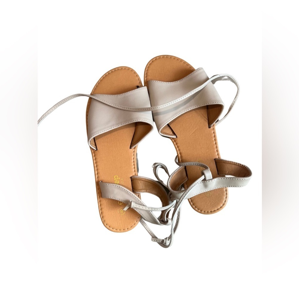 NWOT Nude Flat Tie Up Sandals